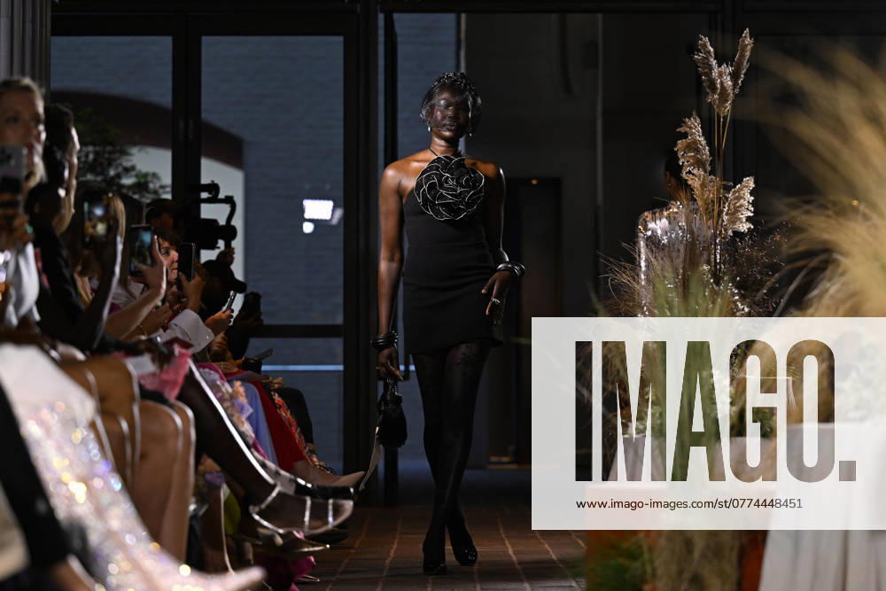 MELBOURNE FASHION WEEK PREVIEW, A model walks the runway during a Melbourne Fashion Week media preview in Melbourne, Monday, October 21, 2024. ( NO ARCHIVING, , NO USE IN BOOKS WITHOUT CONSENT Melbourne Victoria Australia