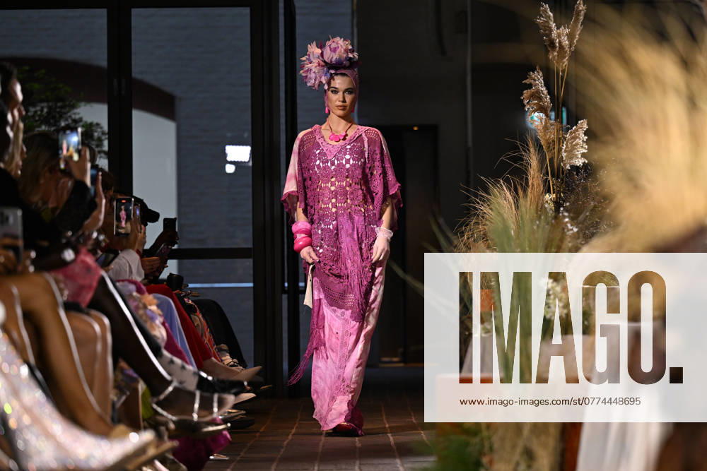 MELBOURNE FASHION WEEK PREVIEW, A model walks the runway during a Melbourne Fashion Week media preview in Melbourne, Monday, October 21, 2024. ( NO ARCHIVING, , NO USE IN BOOKS WITHOUT CONSENT Melbourne Victoria Australia