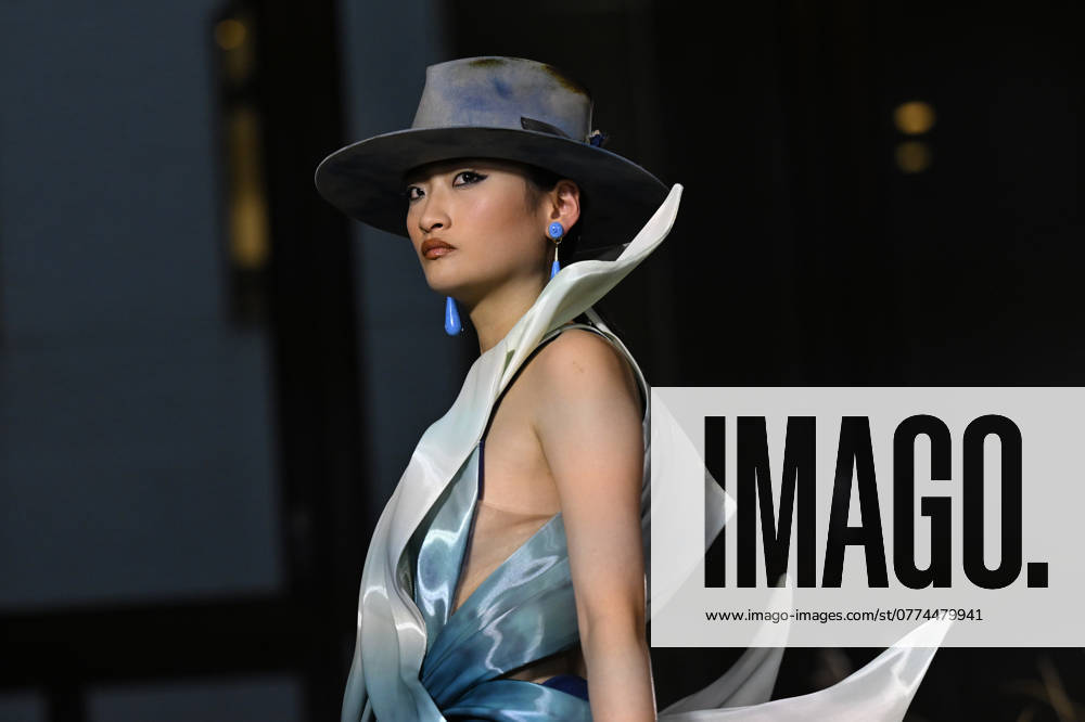 MELBOURNE FASHION WEEK PREVIEW, A model walks the runway during a Melbourne Fashion Week media preview in Melbourne, Monday, October 21, 2024. ( NO ARCHIVING, , NO USE IN BOOKS WITHOUT CONSENT Melbourne Victoria Australia