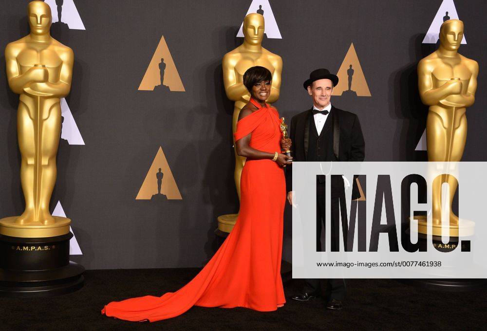 Actress Viola Davis (L), winner of the award for Actress in a Supporting Role for Fences , and presenter Mark Rylance appear backstage during the 89th annual Academy Awards at Loews Hollywood Hotel in the Hollywood section of Los Angeles on February 26, 2017. LAP20170226923 JIMxRUYMEN