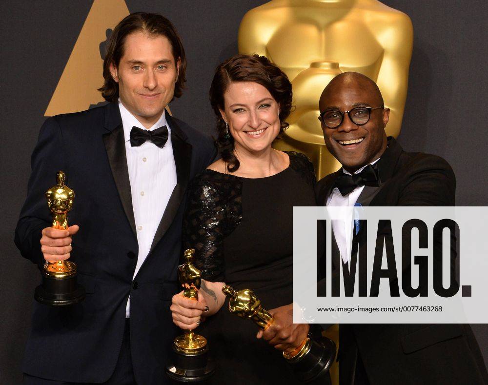 Producer Jeremy Kleiner (L), producer Adele Romanski (C), and writer director Barry Jenkins, winners of the award for Best Picture for Moonlight , appear backstage during the 89th annual Academy Awards at Loews Hollywood Hotel in the Hollywood section of Los Angeles on February 26, 2017. LAP201702261069 JIMxRUYMEN