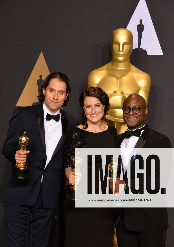 Producer Jeremy Kleiner (L), producer Adele Romanski (C), and writer director Barry Jenkins, winners of the award for Best Picture for Moonlight , appear backstage during the 89th annual Academy Awards at Loews Hollywood Hotel in the Hollywood section of Los Angeles on February 26, 2017. LAP201702261070 JIMxRUYMEN