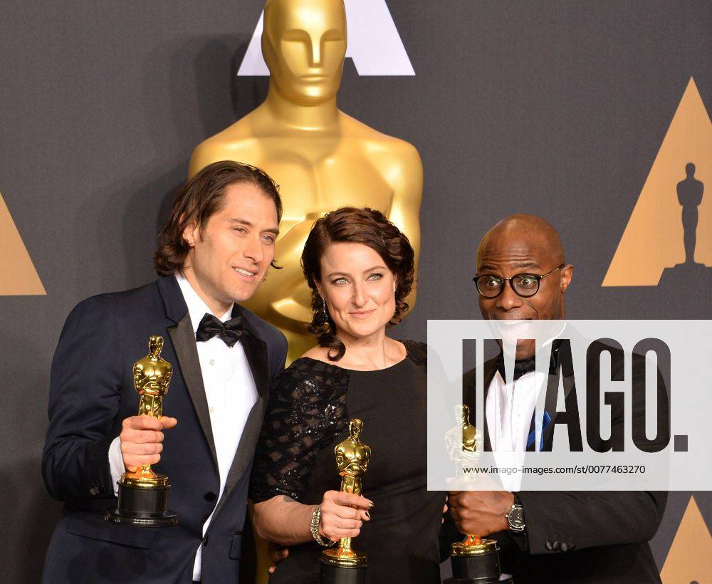 Producer Jeremy Kleiner (L), producer Adele Romanski (C), and writer director Barry Jenkins, winners of the award for Best Picture for Moonlight , appear backstage during the 89th annual Academy Awards at Loews Hollywood Hotel in the Hollywood section of Los Angeles on February 26, 2017. LAP201702261071 JIMxRUYMEN