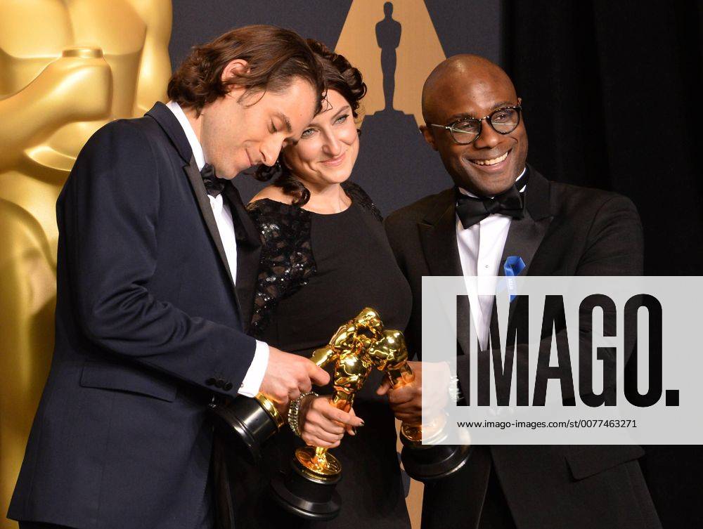 Producer Jeremy Kleiner (L), producer Adele Romanski (C), and writer director Barry Jenkins, winners of the award for Best Picture for Moonlight , appear backstage during the 89th annual Academy Awards at Loews Hollywood Hotel in the Hollywood section of Los Angeles on February 26, 2017. LAP201702261072 JIMxRUYMEN
