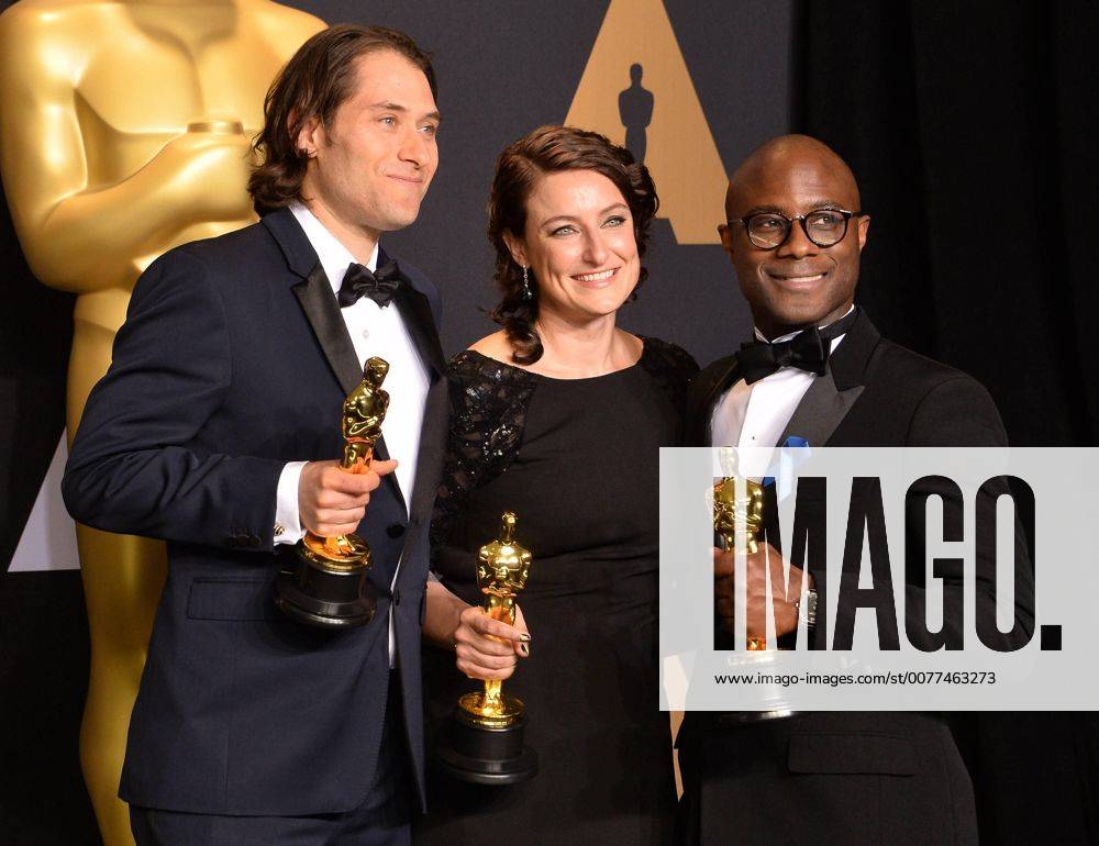 Producer Jeremy Kleiner (L), producer Adele Romanski (C), and writer director Barry Jenkins, winners of the award for Best Picture for Moonlight , appear backstage during the 89th annual Academy Awards at Loews Hollywood Hotel in the Hollywood section of Los Angeles on February 26, 2017. LAP201702261074 JIMxRUYMEN