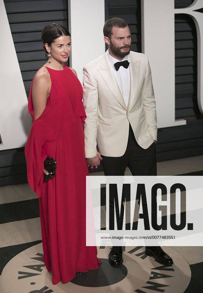 Beverly Hills, California, U.S - Amelia Warner & Jamie Dornan on the red carpet at the 2017 Vanity Fair Oscar Party held at the Wallis Annenberg Center in Beverly Hills, California, Sunday February 26, 2017. JAVIER ROJAS PI Beverly Hills U.S. - ZUMAp124 20170227_zaa_p124_148