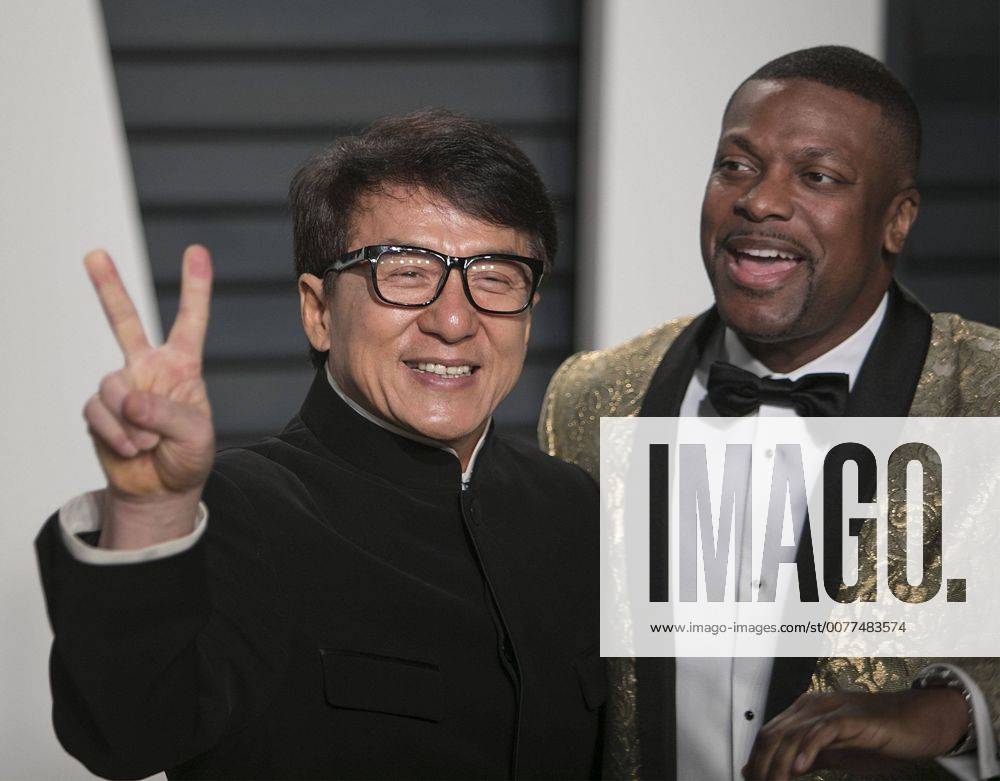 Beverly Hills, California, U.S - Jackie Chan & Chris Tucker on the red carpet at the 2017 Vanity Fair Oscar Party held at the Wallis Annenberg Center in Beverly Hills, California, Sunday February 26, 2017. Beverly Hills U.S. - ZUMAp124 20170226_zaa_p124_818