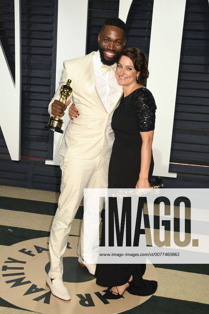 Beverly Hills, CA, United States - 26 February 2017 - Beverly Hills, California - Tarell Alvin McCraney, Adele Romanski. 2017 Vanity Fair Oscar Party held at the Wallis Annenberg Center. Photo Credit: AdMedia Beverly Hills United States - ZUMAa123 20170227_zaa_a123_980