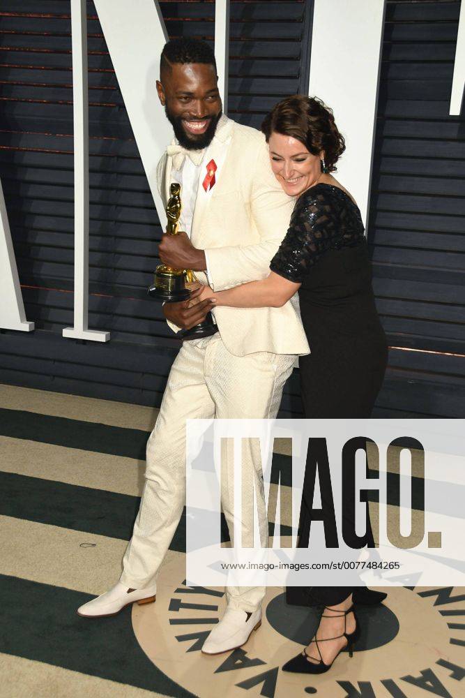 Beverly Hills, CA, United States - 26 February 2017 - Beverly Hills, California - Tarell Alvin McCraney, Adele Romanski. 2017 Vanity Fair Oscar Party held at the Wallis Annenberg Center. Photo Credit: AdMedia Beverly Hills United States - ZUMAa123 20170227_zaa_a123_942