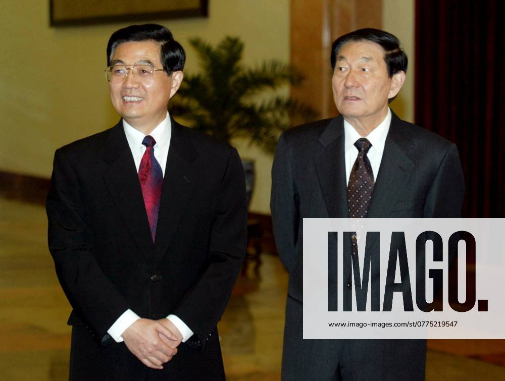 China Jiang Zhu Rongji Hu Jintao Chinese Vice-President Hu Jintao (L) and Premier Zhu Rongji (R) attend a farewell ceremony in Beijing for President Jiang Zemin before his departure to the United States. 22 October 2002