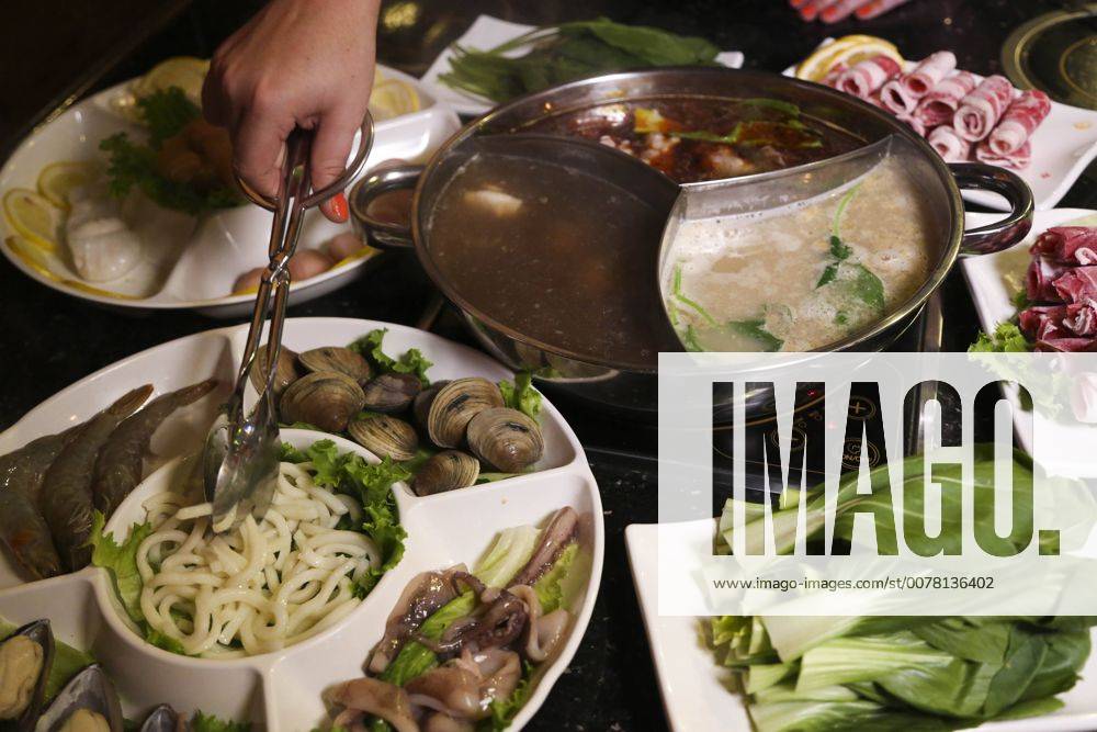 St. Petersburg, Florida, U.S. - EVE EDELHEIT Times.Another option for cooking meat at the restaurant is by Hot Pot which is used to cook the meat, seafood and vegetables in different types of soups and broth at 66 Q-Pot Korean BBQ in Pinellas Park on Wednesday, April 13, 2017. St. Petersburg U.S. - ZUMAs70_ 20170412_zan_s70_026