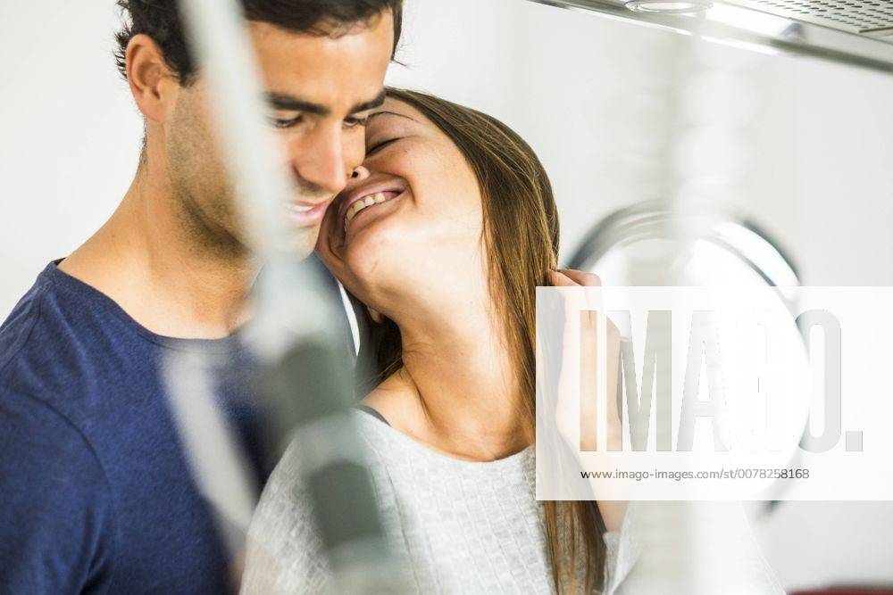 Young couple in love at home model released Symbolfoto property released SIPF01542
