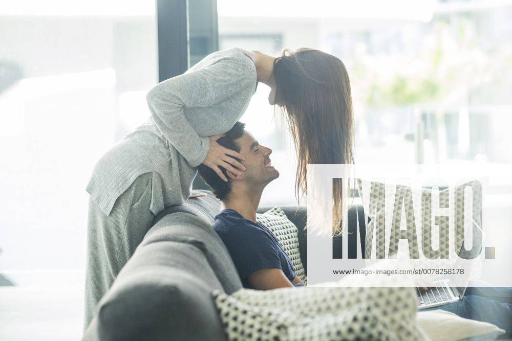 Young couple in love at home model released Symbolfoto property released SIPF01553