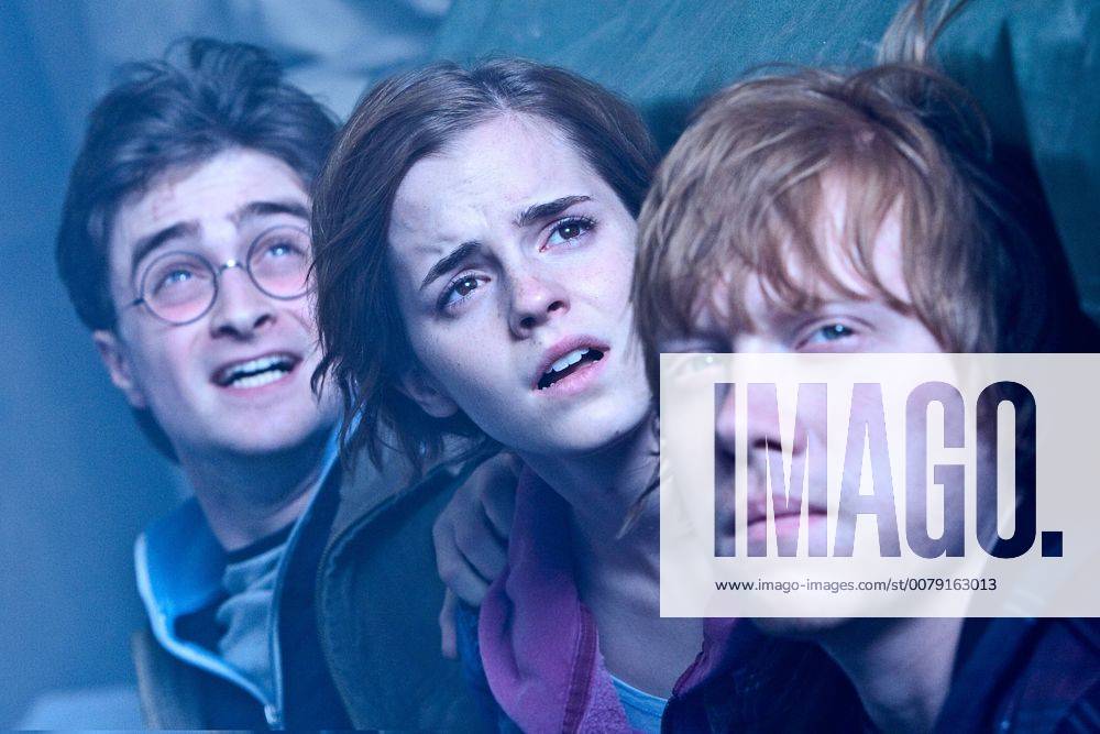 (L-r) DANIEL RADCLIFFE as Harry Potter, EMMA WATSON as Hermione Granger and RUPERT GRINT as Ron Weasley in Warner Bros. Pictures? fantasy adventure HARRY POTTER AND THE DEATHLY HALLOWS ? PART 2, a Warner Bros. Pictures release.