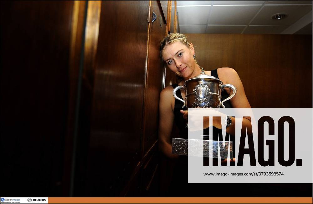 Tennis - French Open - Roland Garros, Paris, France - 9 Tennis - French Open - Roland Garros, Paris, France - 9 6 12 Women s Singles - Russia s Maria Sharapova celebrates winning the final with the trophy Mandatory Credit: Action Images Pool Pic Livepic PHOTO NEWS France