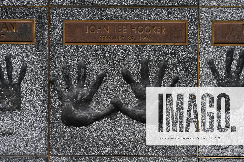 Handprints of John Lee Hooker on the rock walk in the entrance to the Guitar Center Music Store on Sunset Boulevard, Hollywood, Los Angeles, California, USA