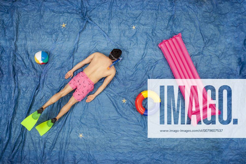 Man snorkelling in the sea model released Symbolfoto BAEF01487