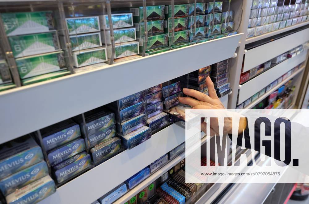A street stall in Central displays a variety of cigarettes for sale in one of the busiest districts in Hong Kong. The Hong Kong Council on Smoking and Health said the tobacco tax should be increased by 75% to reach international standards. 30JAN24 SCMP May Tse Hong Kong China