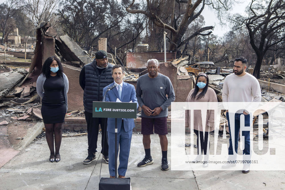 Lawyer Doug Boxer, 3rd L, speaks in a press conference held by LA Fire Justice to discuss its lawsuit against Southern California Edison on behalf of Walter Butler, 3rd R, a local shoe store operator who lost his home in the Eaton Fire. The event took place outside Butler s destroyed home in Altadena, California, on Feb. 4, 2025. Los Angeles USA - ZUMAc68_ 20250204_zaf_c68_020