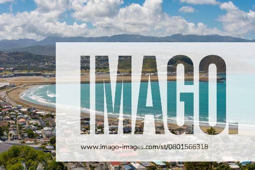 New Zealand, Wellington. Lyall Bay from an elevated position, looking east to the bay, airport and the Orongorongo Hills behind. Fine summers day. 16063373 RECORD DATE NOT STATED