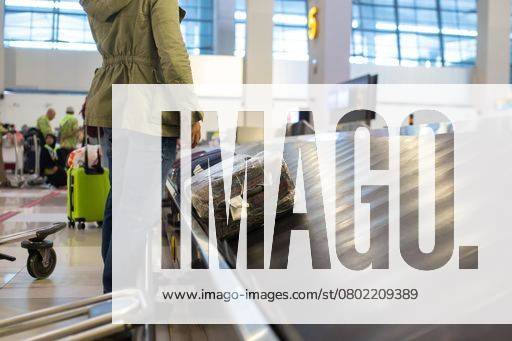 The luggage belt with suitcases being delivered to the passengers at the arrival terminal 22226015 RECORD DATE NOT STATED