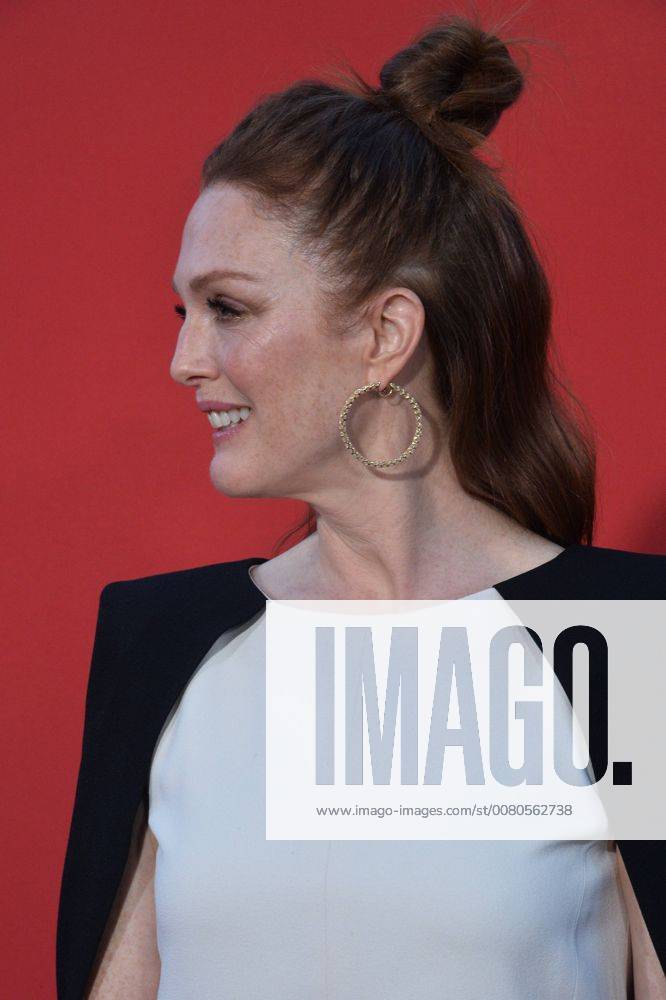 Cast member Julianne Moore attends the premiere of the motion picture crime thriller Suburbicon at the Regency Village Theatre in the Westwood section of Los Angeles on October 22, 2017. Storyline: Suburbicon is a peaceful, idyllic suburban community with affordable homes and manicured lawnsÉthe perfect place to raise a family, and in the summer of 1959, the Lodge family is doing just that. But the tranquil surface masks a disturbing reality, as husband and father Gardner Lodge (Matt.Damon) must navigate the townÕs dark underbelly of betrayal, deceit, and violence. This is a tale of.very flawed people making very bad choices. This is Suburbicon. LAP2017102220 JIMxRUYMEN