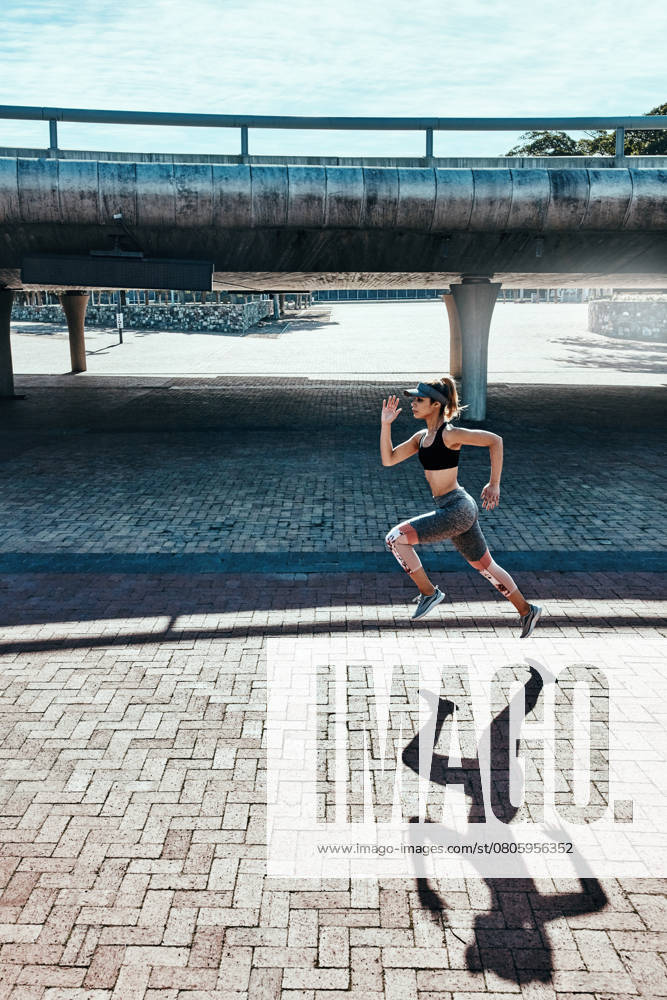 One mile at a time...Full length shot of an attractive and athletic young woman running through the city, model released, , 51752616.jpg, length, attractive, athletic, young, woman, city, running, female, women, people, natural, fitness, adult, one, looking, sport, 20s, outside, person, outdoor, outdoors, casual, ethnic, healthy, health, lifestyle, fit, training, exercise, confident, workout, modern, copyspace, wellness, candid, urban, run, active, ethnicity, jogging, runner, sporty, flare, athlete, confidence, exercising, routine, sportswear, vitality, physical RECORD DATE NOT STATED