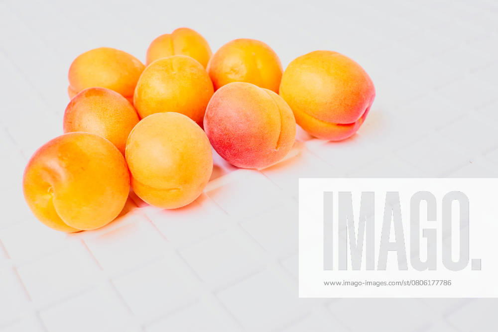 A juicy, soft fruit, resembling a small peach, of an orange-yellow color. , 51907670.jpg, additive, alimentary, apricot, August, bakery, care, cook, cooking, crop, east, fetus, flavoring, floral, food, fruit, gastronomy, greengrocery, harvest, health, herbal, hue, kernel, kitchen, magnesium, Mediterranean, mineral, nut, nutritive, nutty, offspring, palatable, phosphorus, pie, pleasant, Potassium, profit, protein, savory, seed, sodium, soundness, spice, summer, tasty, tree, usefully, vitamin, yummy, jazz, supplement RECORD DATE NOT STATED