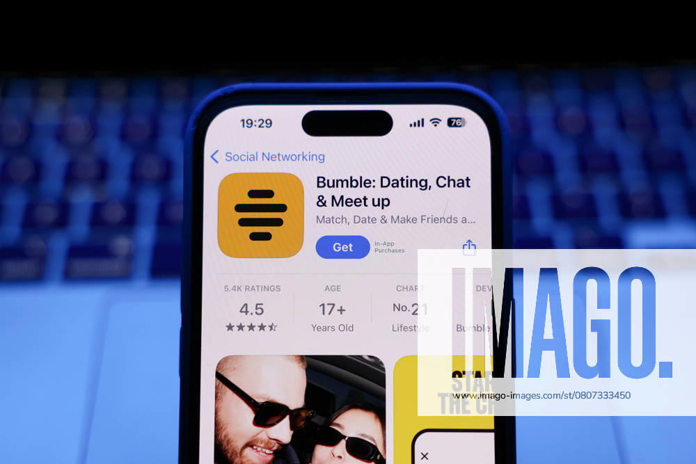 Top Apps Photo Illustrations A laptop keyboard and Bumble on App Store displayed on a phone screen are seen in this illustration photo taken in Krakow, Poland on March 17, 2025. Krakow Poland