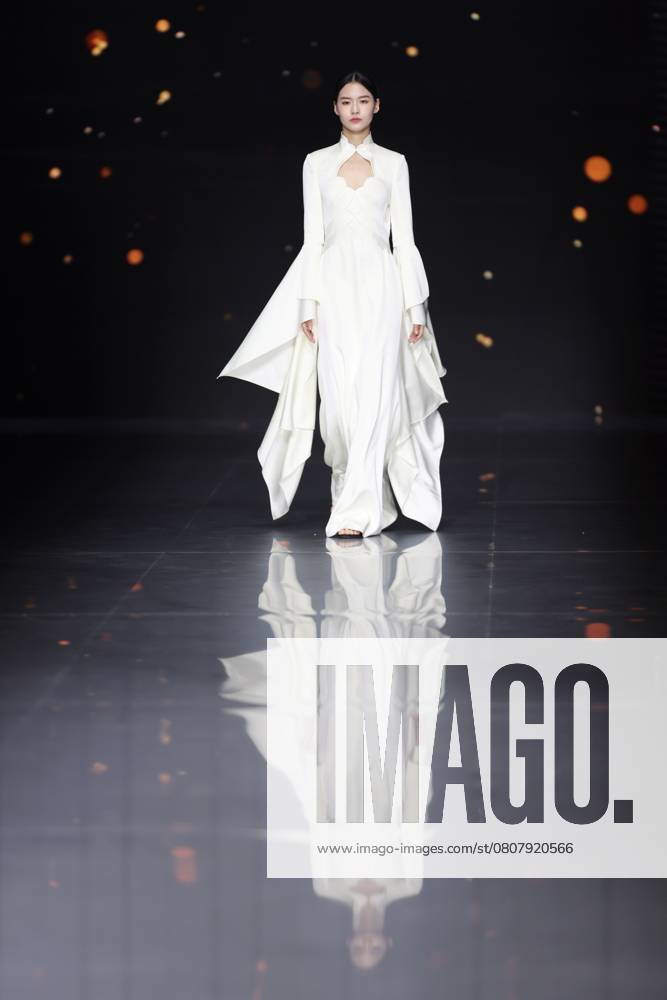 A model walks the runway at the starry night closing show on day 8 of China Fashion Week A W2025 at 798·751 PARK on March 28, 2025 in Beijing, China.