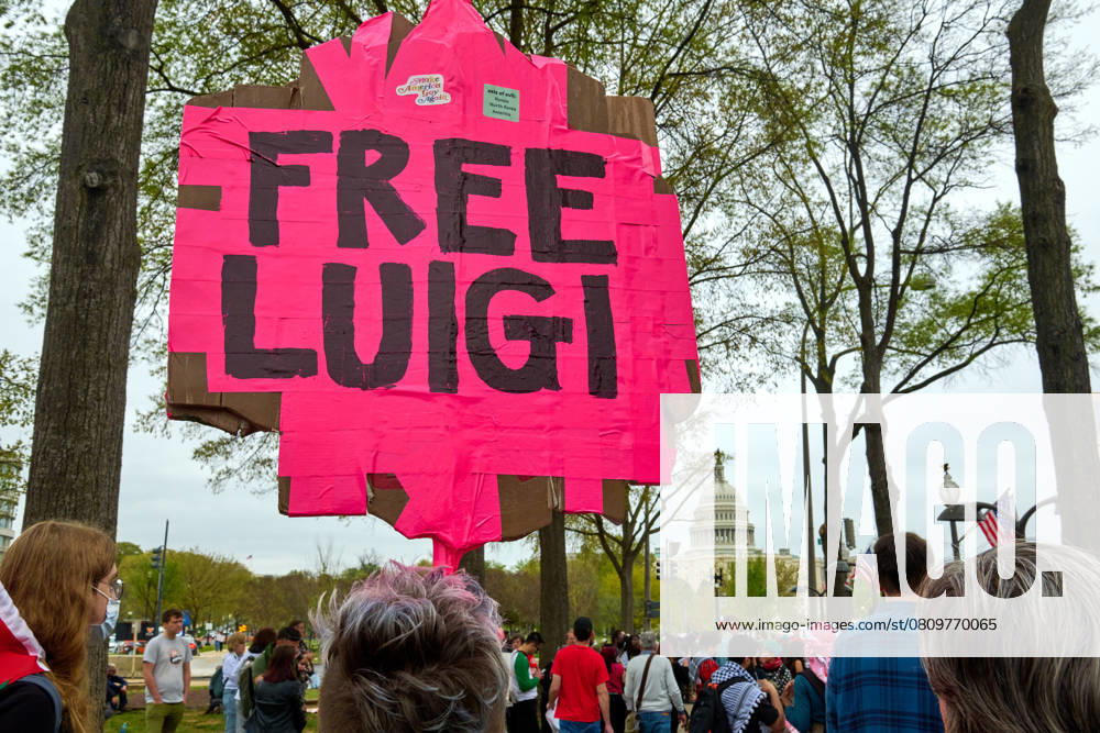 Washington DC Anti-Trump Hands-Off Protest A sign calling for the release of Luigi Mangione in Washington D.C. during the Let Gaza Live protest in support of Palestine, Saturday, April 5, 2025. Washington District of Columbia United States
