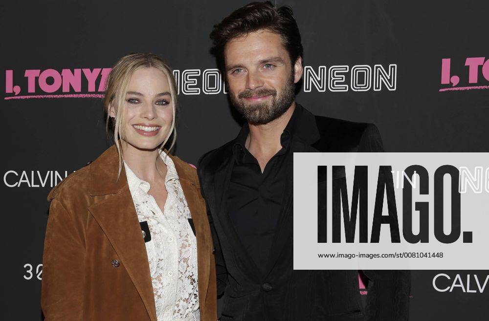 Margot Robbie and Sebastian Stan arrive on the red carpet at the I, Tonya New York Premiere at Village East Cinema on November 28, 2017 in New York City. NYP20171128110 JOHNxANGELILLO