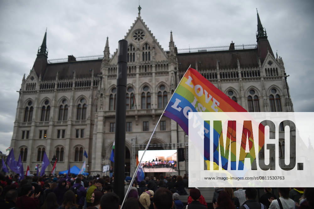 Protestors Protesters Against A Fundamental Law Change Restricting The Right Of Assembly An LMBT+ flag is at a rally in front of the Hungarian Parliament in Budapest, Hungary, on April 14. The protests erupt after the parliament passes legislation restricting the right to assembly, banning Pride Marches. Budapest Hungary