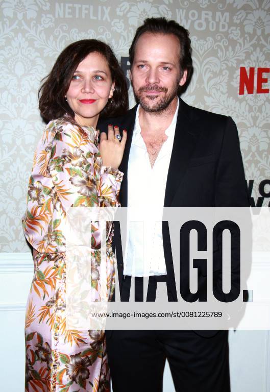 NEW YORK, NY - DECEMBER 12: Maggie Gyllenhaal, Peter Sarsgaard, at the Netflix premiere of Wormwood at The Campbell in New York City on December 12, 2017.