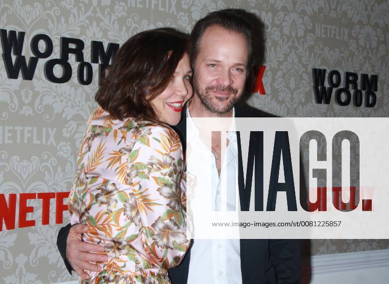 NEW YORK, NY - DECEMBER 12: Maggie Gyllenhaal, Peter Sarsgaard, at the Netflix premiere of Wormwood at The Campbell in New York City on December 12, 2017.