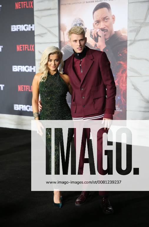 WESTWOOD, CA - DECEMBER 13: Bebe Rexha, Machine Gun Kelly, at Premiere Of Netflix s Bright at The Regency Village Theatre, In Hollywood, California on December 13, 2017.