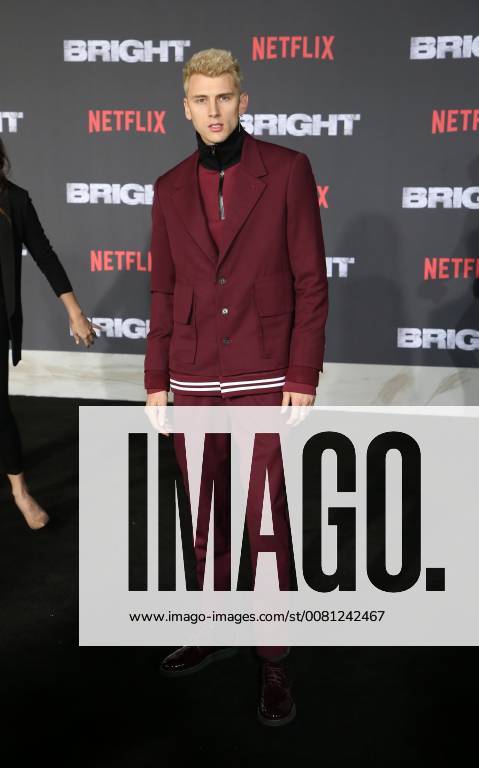 WESTWOOD, CA - DECEMBER 13: Machine Gun Kelly, at Premiere Of Netflix s Bright at The Regency Village Theatre, In Hollywood, California on December 13, 2017.