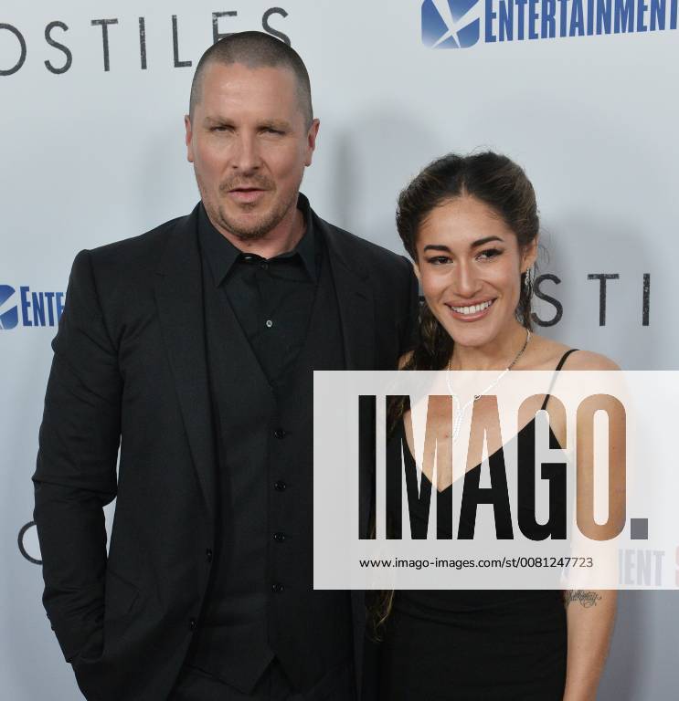 Cast members Christian Bale and Q orianka Kilcher attend the premiere of the motion picture western Hostiles at the Academy of Motion Picture Arts & Sciences in Beverly Hills, California on December 14, 2017. Storyline: In 1892, a legendary Army captain reluctantly agrees to escort a Cheyenne chief and his family through dangerous territory. LAP2017121402 JIMxRUYMEN