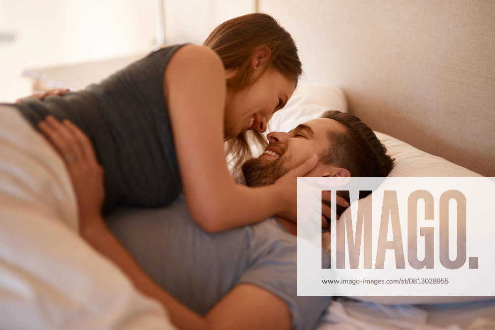 Happy, love or couple in bed with desire, romance or intimacy, connection or bonding at home. Eye contact, foreplay or passion, attraction or trust in bedroom for anniversary or honeymoon celebration., model released, , property released, , 59218938.jpg, happy, love, couple, bed, home, bedroom, desire, romance, foreplay, celebration, man, room, at home, play, passion, bonding, trust, honeymoon, connection, intimacy, anniversary, attraction, eye contact, woman, female, women, young, girl, people, sex, face, male, hands, adult, smile, house, erotic, sensual, sexual, person, fun, care, lifestyle, together, hotel, morning, happiness, touching, wife, hospitality RECORD DATE NOT STATED