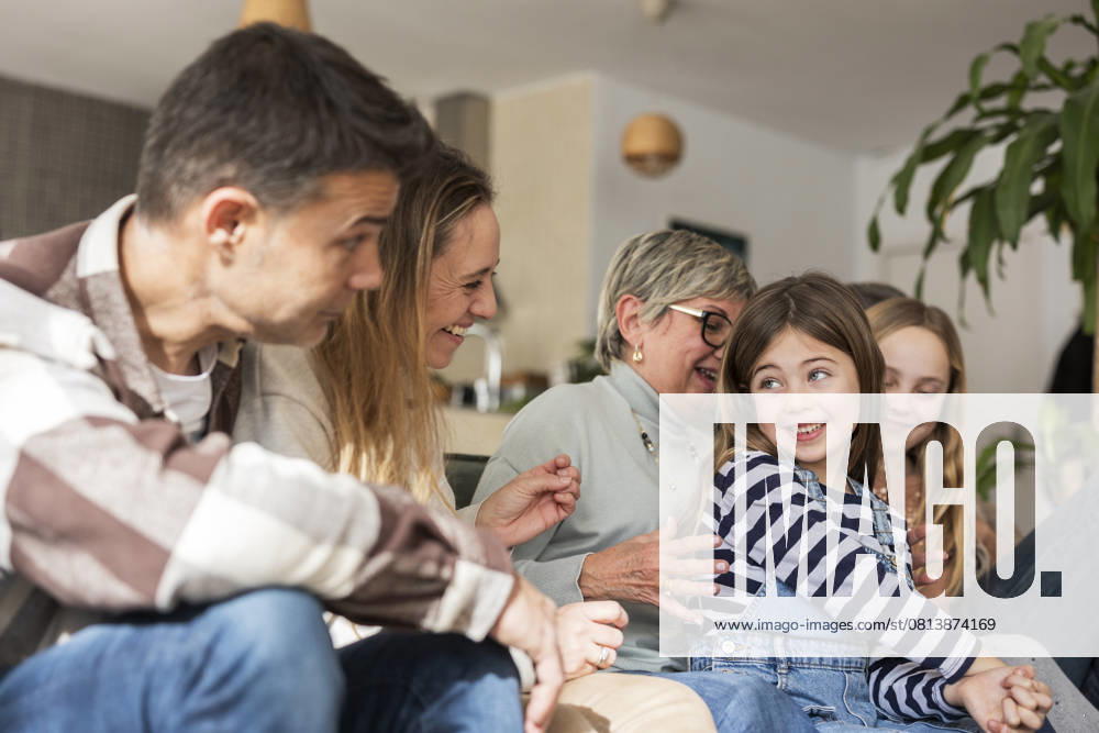 Family enjoying a joyful moment together indoors model released, Symbolfoto property released, JCCMF13362