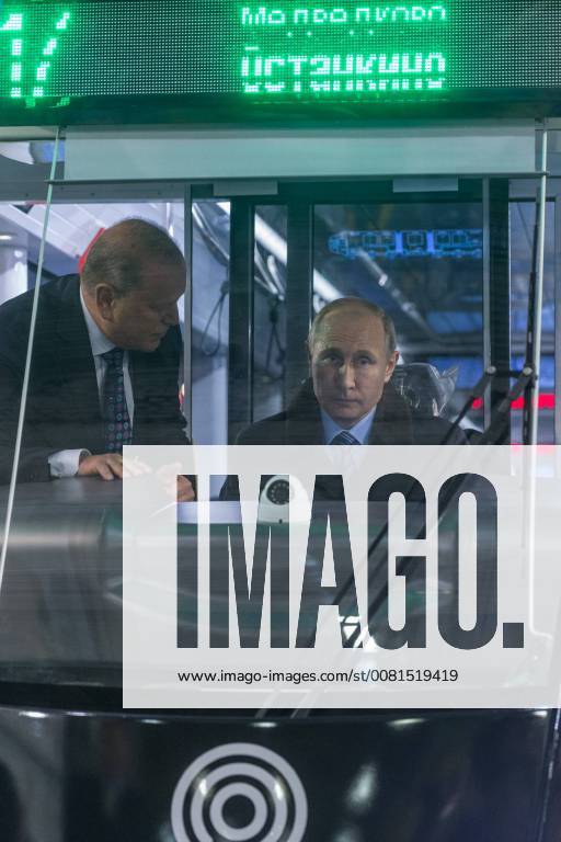 (180110) -- TVER (RUSSIA), Jan. 10, 2018 -- Russian President Vladimir Putin (R) inspects the cabin of a tram at the Tver Carriage Works in Tver, Russia, on Jan. 10, 2018. Inflation in Russia hit a record low of 2.5 percent last year, the country s official statistics service Rosstat said Wednesday. The Russian economy is improving and the positive momentum continues, President Vladimir Putin said Wednesday when visiting the railway carriage factory. ) RUSSIA-TVER-PUTIN-VISIT BaixXueqi