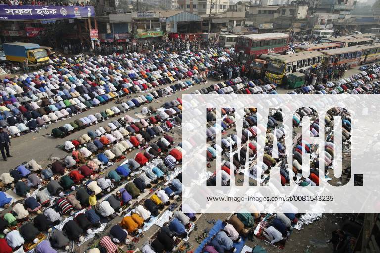 Tongi, Bangladesh - Bangladeshi Muslim devotees offer Jumma prayer on the first day of the Biswa Ijtema, the second largest Muslim congregation of the world, at Tongi, near Dhaka, Bangladesh. The first phase of Biswa Ijtema starts today with Jumma prayer and Muslim devotees from across the world participate in the second world congregation of Muslims. Tongi Bangladesh - ZUMAd117 20180112_zap_d117_009