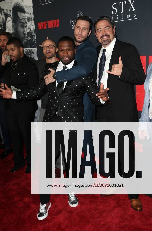 LOS ANGELES, CA - JANUARY 17: Oshea Jackson Jr, Gerard Butler, Pablo Schreiber, Curtis Jackson, at the premiere of Den Of Thieves at Regal Theaters at LA Live in Los Angeles, California on January 17, 2018.