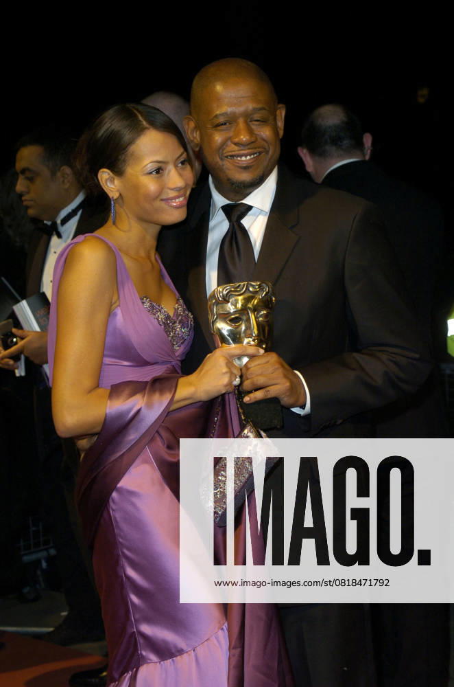 Official Bafta Film Awards After Party KEISHA WHITAKER & FOREST WHITAKER Arrivals at the Official Bafta Film Awards After Party, Grosvenor House Hotel, Park Lane, London, England, February 11th 2007. half length purple dress trophy bafta married husband wife couple CAP CAN Can Nguyen London Great Britain