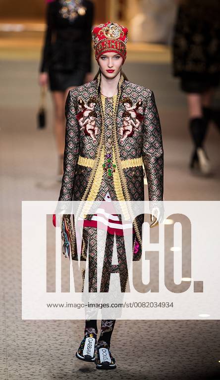 (180226) -- MILAN, Feb. 26, 2018 -- A model presents a creation of Dolce&Gabbana Fashion Devotion Autumn Winter 18 19 women s collection during Milan Fashion Week in Milan, Italy, Feb. 25, 2018. ) (zxj) ITALY-MILAN-FASHION WEEK-DOLCE&GABBANA JinxYu
