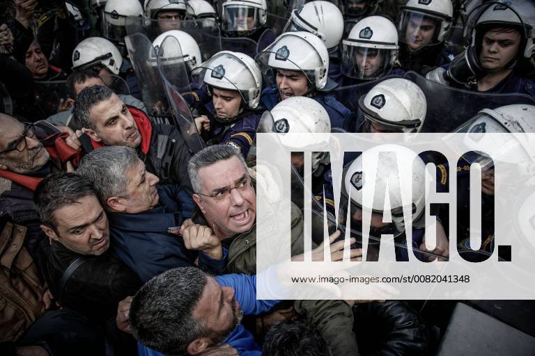 Athens, Greece - Municipal workers clash with police outside Greek parliament. Greece s government is opening Monday a last round of reforms talks with bailout creditors, just five months before the country s massive rescue loan program ends. Athens Greece - ZUMAe114 20180226_zaa_e114_003