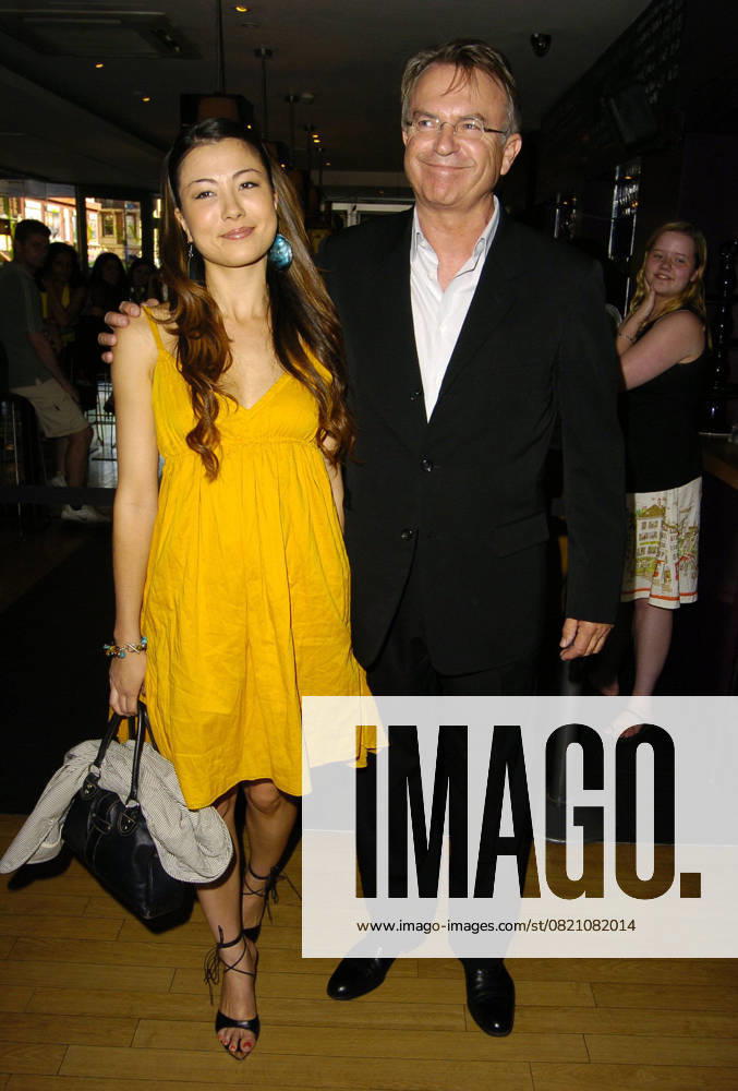 UK Film Premiere of Little Fish , SAM NEILL & DAUGHTER At the UK Film Premiere of Little Fish , Curzon Soho, London, England, 16th July 2006. full length father daughter family yellow mustard dress Ref: CAN Can Nguyen London Great Britain
