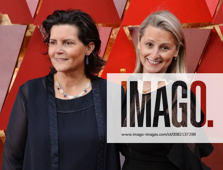 Film editor Tatiana S. Riegel and guest arrive on the red carpet for the 90th annual Academy Awards at the Dolby Theatre in the Hollywood section of Los Angeles on March 4, 2018. LAP20180304348 JIMxRUYMEN