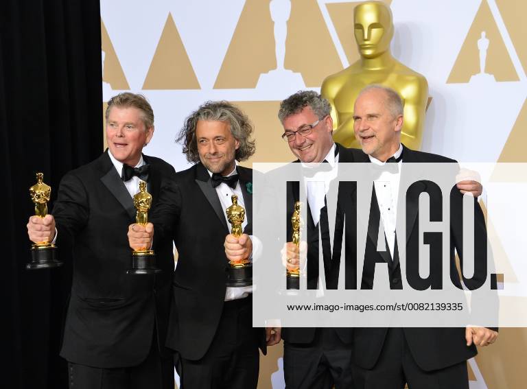 (L-R) Visual effects artists Richard R. Hoover, Paul Lambert, Gerd Nefzer, and John Nelson, winners of the award for Best Visual Effects award for Blade Runner 2049, appear backstage with their Oscars during the 90th annual Academy Awards at Loews Hollywood Hotel in the Hollywood section of Los Angeles on March 4, 2018. LAP201803041020 JIMxRUYMEN