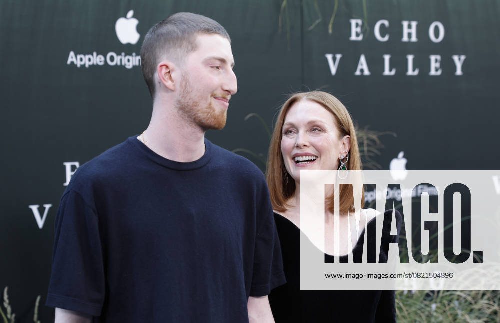 Julianne Moore and her son Caleb Freundlich arrive on the red carpet for the Echo Valley New York Premiere at AMC Lincoln Square 13 on June 04, 2025 in New York City. NYP20250604228 JOHNxANGELILLO